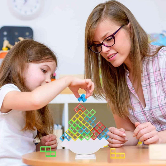 Woman and child playing with colorful puzzle toys at a table.